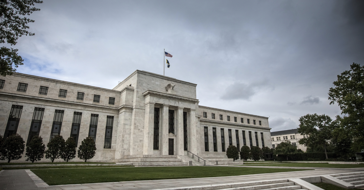 Storm clouds over the Federal Reserve building.