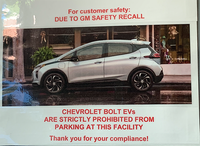Image of sign prohibiting Chevy Bolt EV from parking due to safety recall
