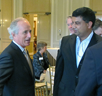 Sen. Bob Corker (R-Tenn), left, participates in the inaugural “District Dialog” hosted by the CFA Society of Nashville.